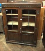 Reproduction oak bookcase with glazed an