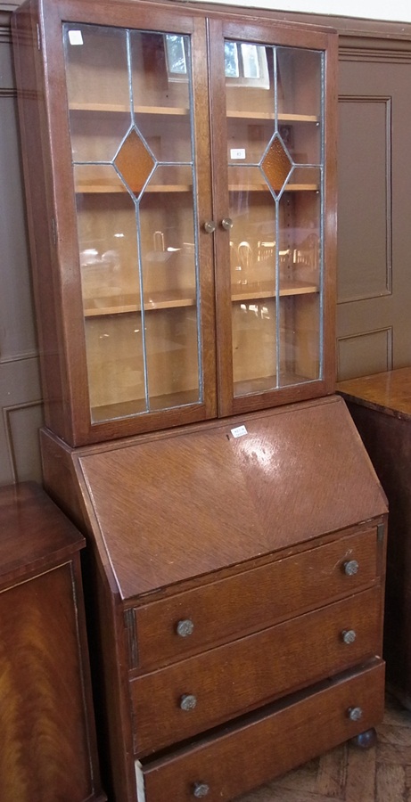 Mid 20th century oak bookcase, the upper