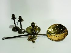 Two brass chamber candlesticks, another