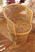 Woven cane tub chair with cylindrical ba
