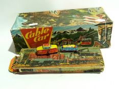 A Technofix tinplate clockwork cable car