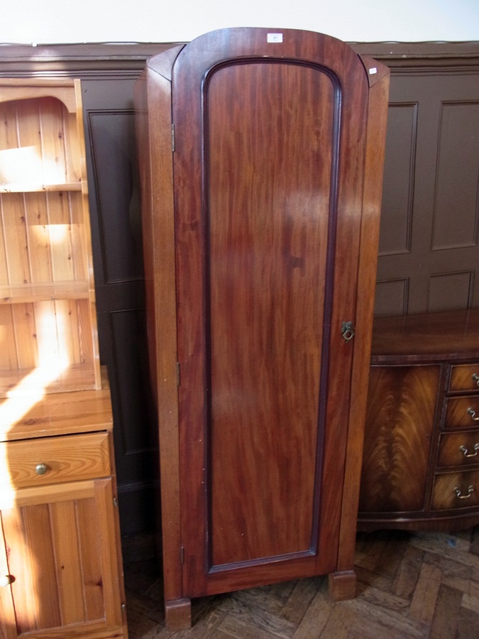 An old mahogany single wardrobe, the pan