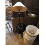 Two contemporary standard lamps, with a