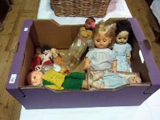 A Rosebud celluloid doll and clothes tog