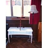 A modern white painted dressing table wi