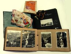 A photograph album with a quantity of ph