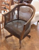 Stained wood and leather revolving desk