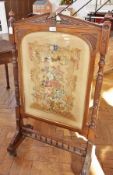 Victorian walnut firescreen with foliate