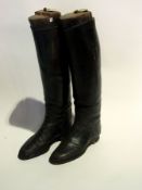 Two pairs of lady's riding boots, one pa