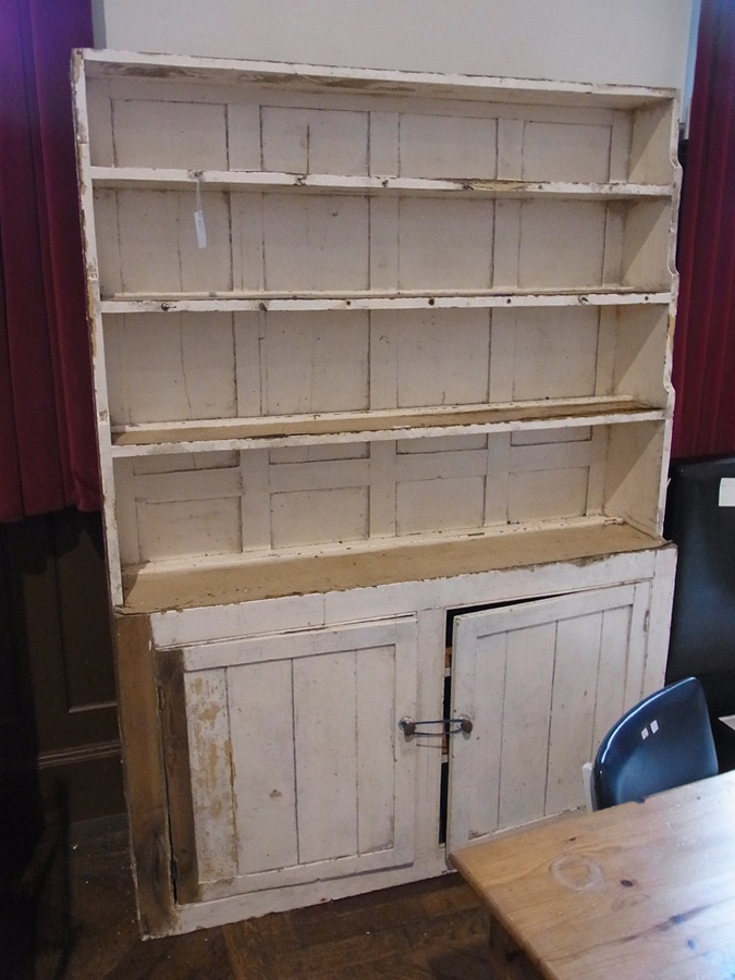 An old painted pine kitchen dresser with