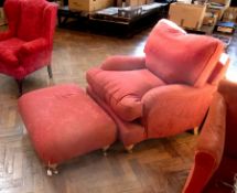 Modern armchair upholstered in red flora