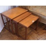 Nest of three hardwood occasional tables