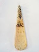 Oriental carved ivory shoe horn with car