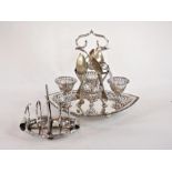 A silver plate four egg cup stand with s