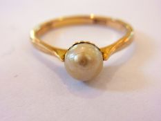 Gold-coloured metal, marked 18ct, pearl