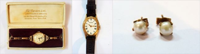 A lady's 9ct gold cased wristwatch, J W