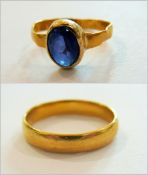A Victorian 22ct gold ring set single ov