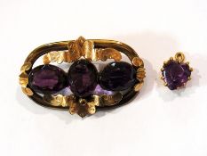 Gold-coloured metal and amethyst brooch