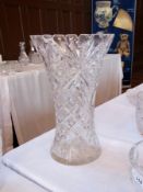 A cut glass vase in waisted shape