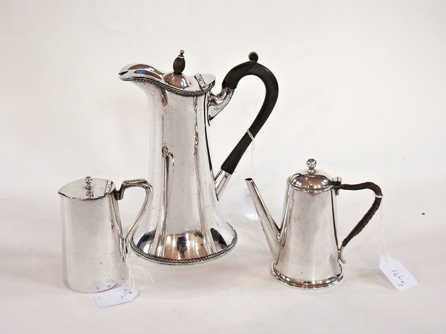 A silver plate lidded hot water jug by W