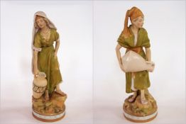 Two Royal Dux, Bohemia rustic tinted bisque porcelain figures, both male and female carrying water