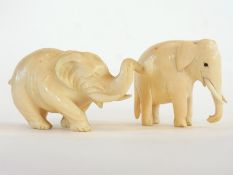 Carved ivory model of an elephant with t