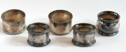 Two pairs of silver napkin rings and ano