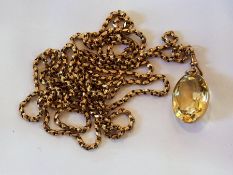 Oval faceted citrine pendant on 9ct gold