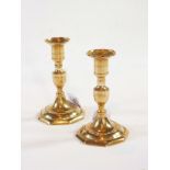 Pair of George III brass candlesticks of