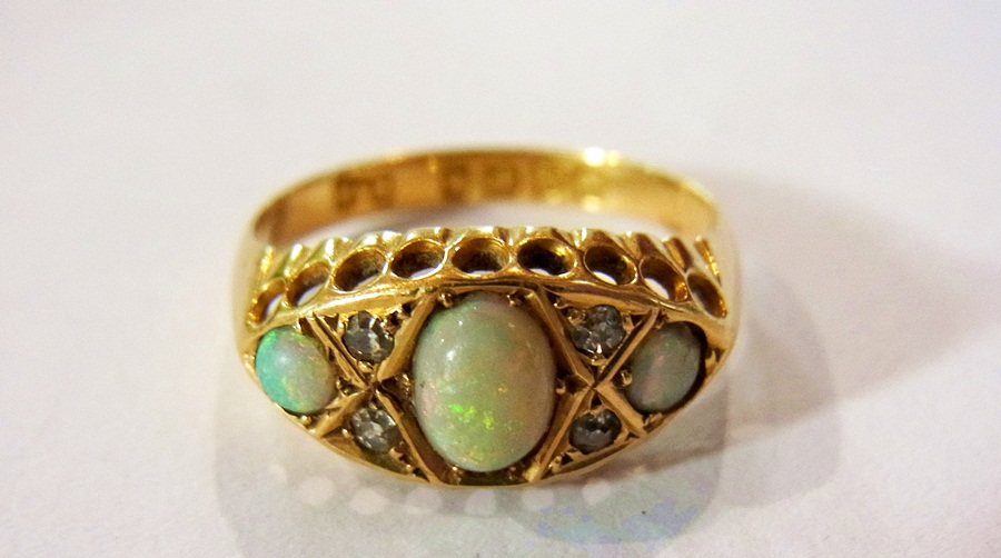 18ct gold opal and diamond ring set thre