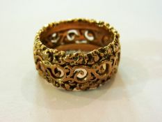 Gold coloured metal ring, embossed and s