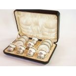 A set of six George V silver mounted Paragon coffee cans along with six saucers  Live Bidding: One