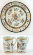 Pair of Armorial porcelain mugs with cre