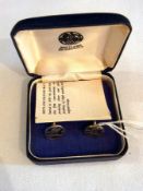 Two cased pairs of cufflinks