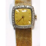A 18ct gold and diamond set lady's wrist