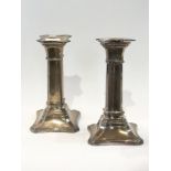 Pair of Victorian silver candlesticks on
