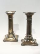 Pair of Victorian silver candlesticks on