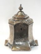 A Victorian silver tea caddy of raised o