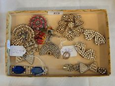 A collection of diamante brooches