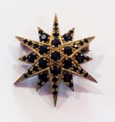 Gold and sapphire starburst brooch, the