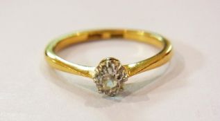 Gold, marked 18ct, and platinum solitair