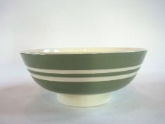 A Wedgwood fruit bowl in a pale green co