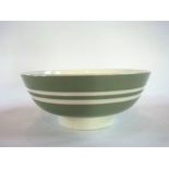 A Wedgwood fruit bowl in a pale green co