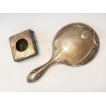 A silver-backed hand mirror, a silver wa