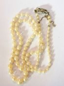 Simulated pearl necklace with white gold