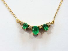 18K gold emerald and diamond necklace se