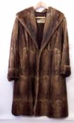 A full length vintage fur coat, possibly