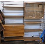 Mid 20th century Ladderax style shelf unit, teak effect with wire metalwork frame and shelves