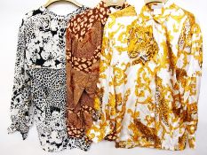 A quantity of Escada silk blouses (10)