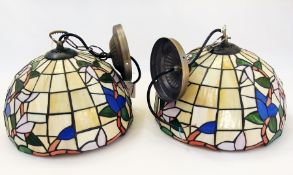 A pair of Tiffany style hanging wall lights